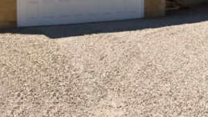 Pea Gravel Driveway Garage - Driveway Cleaning Wilmington, NC Pea gravel driveway leading to a white garage door