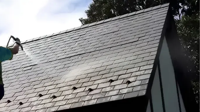 Shingle Roof Soft Washing - Professional Pressure Washing Wilmington, NC Soft washing a shingle roof down to the gutter line - Professional Pressure Washing Wilmington, NC