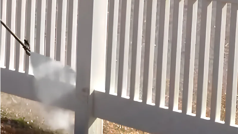 White Vinyl Fence Pressure Washing - Fence Cleaning Wilmington, NC Pressure washing a white vinyl picket fence
